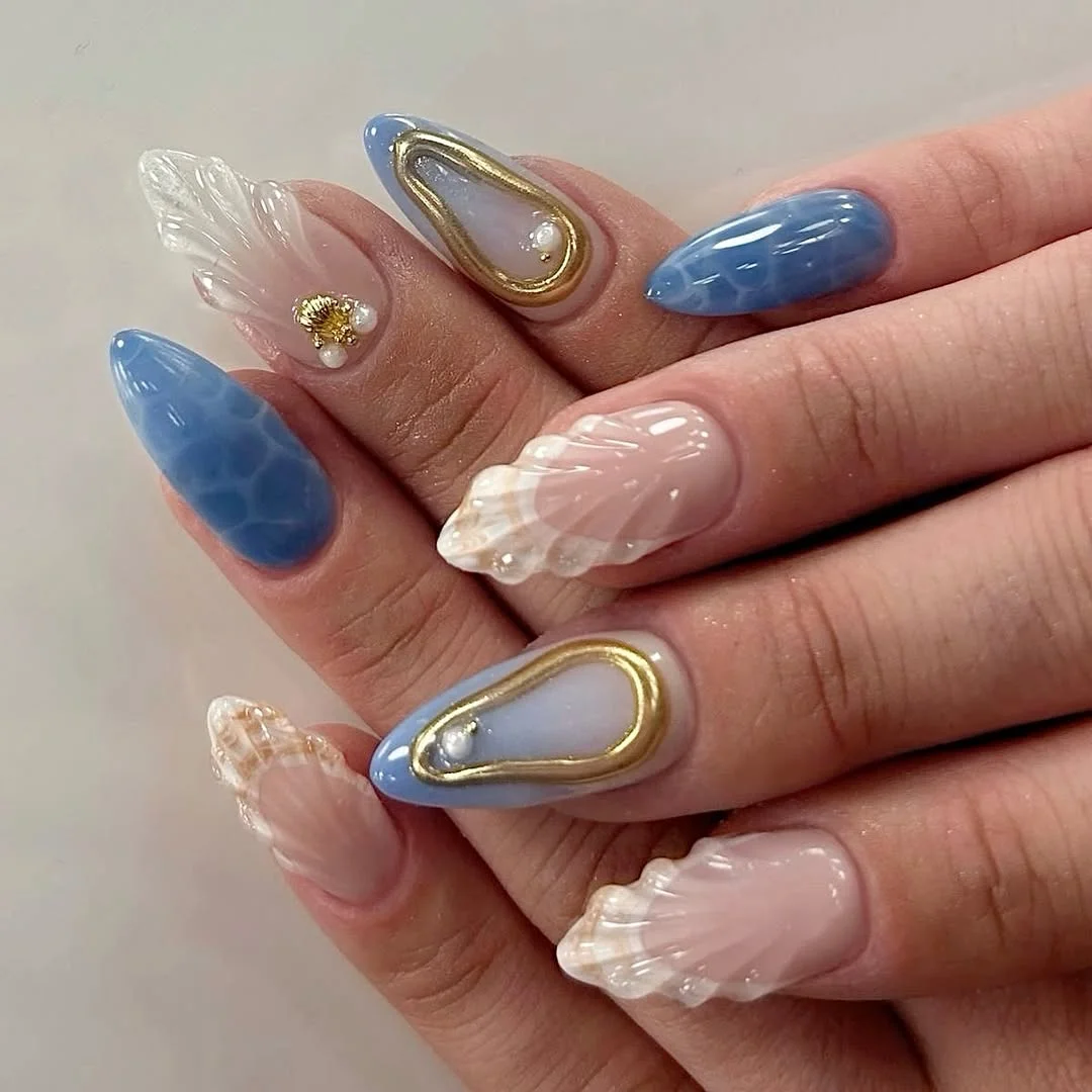 23 Summer nail art ideas 2026 Soft Mermaid Texture Nails With Pearl Details