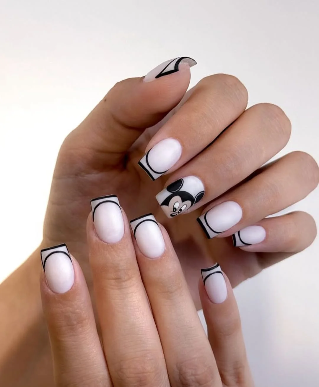 24 summer nail colors 2026 Black and White Cartoon Nails That Make Minimalism Feel Playful Again