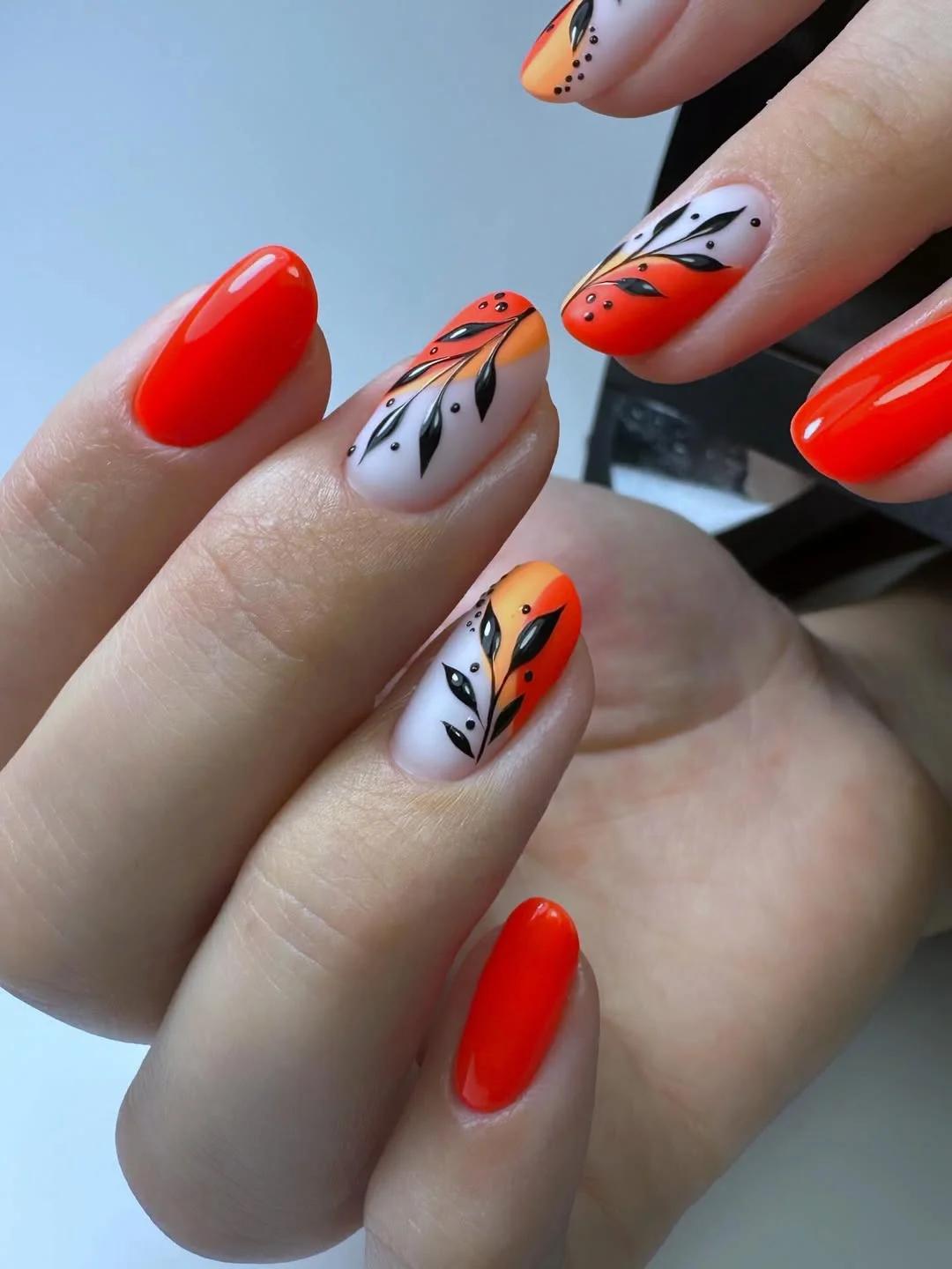 24 summer nail colors 2026 Sunset Orange Floral Nails That Bring Warm Summer Evenings to Mind
