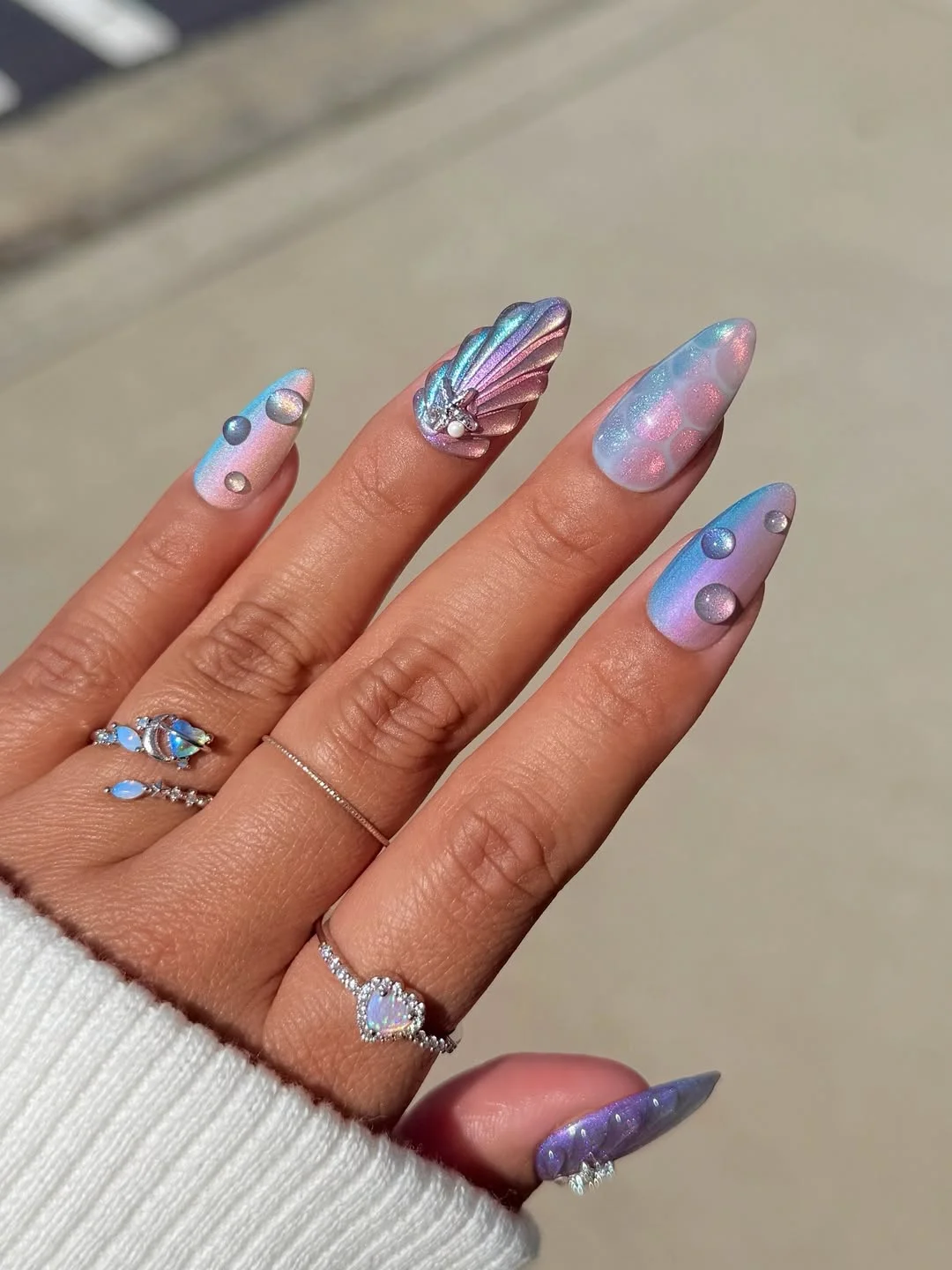 24 summer nail colors 2026 Mermaid Chrome Nails With a Soft Ocean Glow