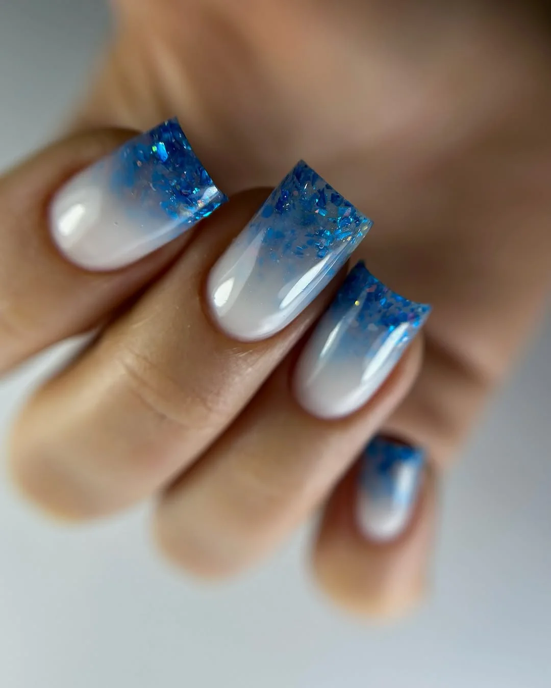 22 summer ombre nails 2026 ocean blue ombre with crushed crystal tips