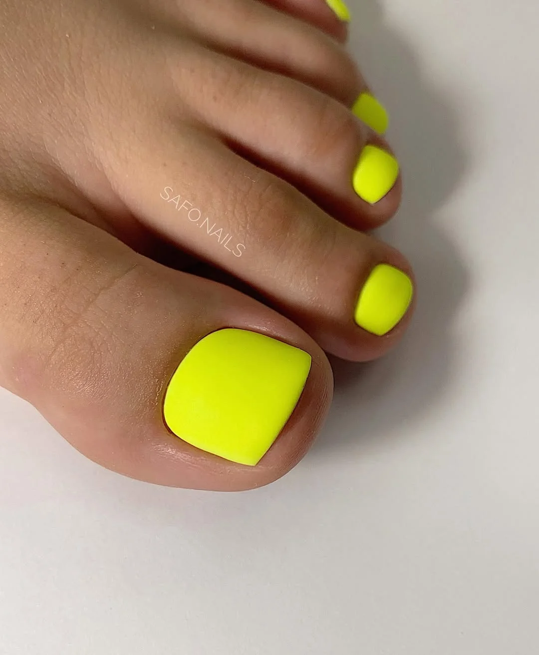 summer pedicure colors 2026 Electric Neon Yellow Pedicure That Refuses to Be Ignored