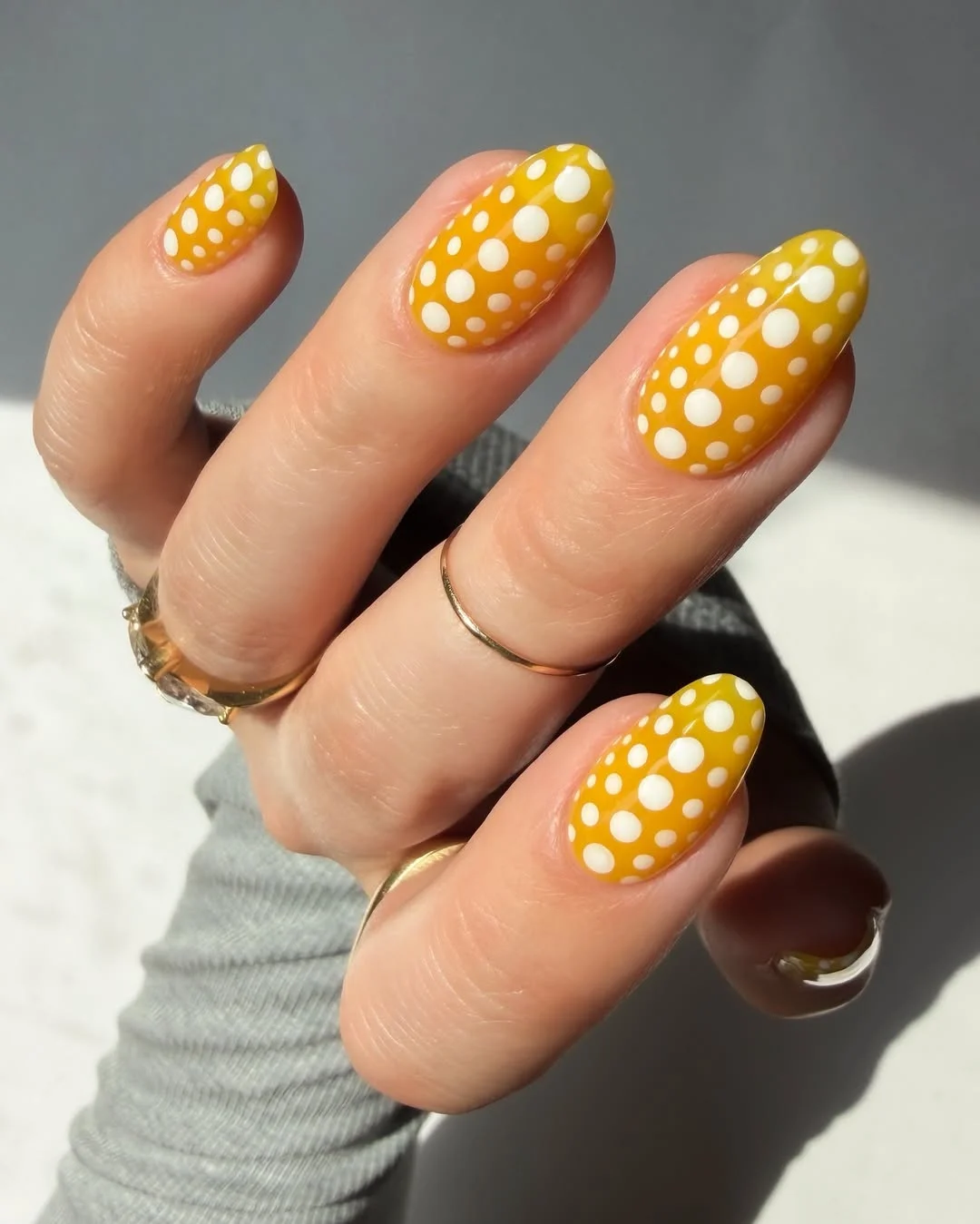 23 Summer yellow nails 2026 Retro Polka Dot Yellow Nails With Playful Vintage Energy