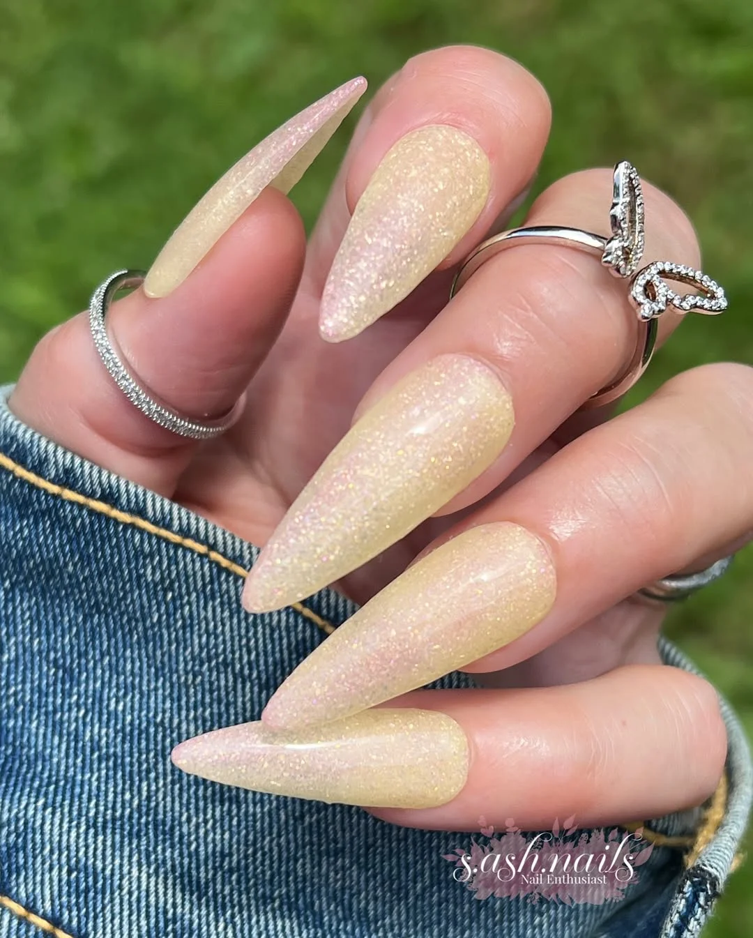 23 Summer yellow nails 2026 Champagne Yellow Shimmer Nails With Soft Glazed Finish