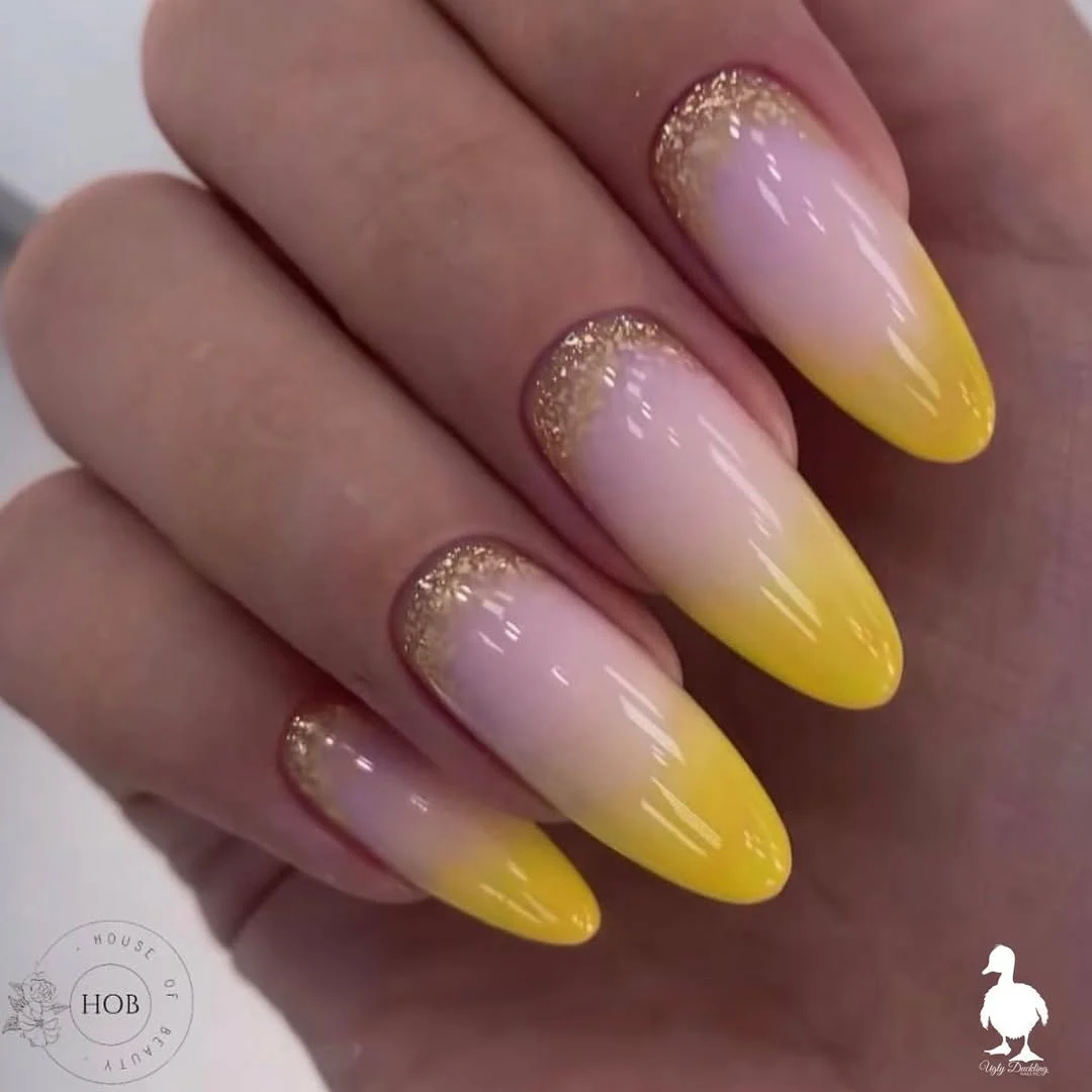 23 Summer yellow nails 2026 Golden Glitter Fade On Soft Yellow Ombre Nails