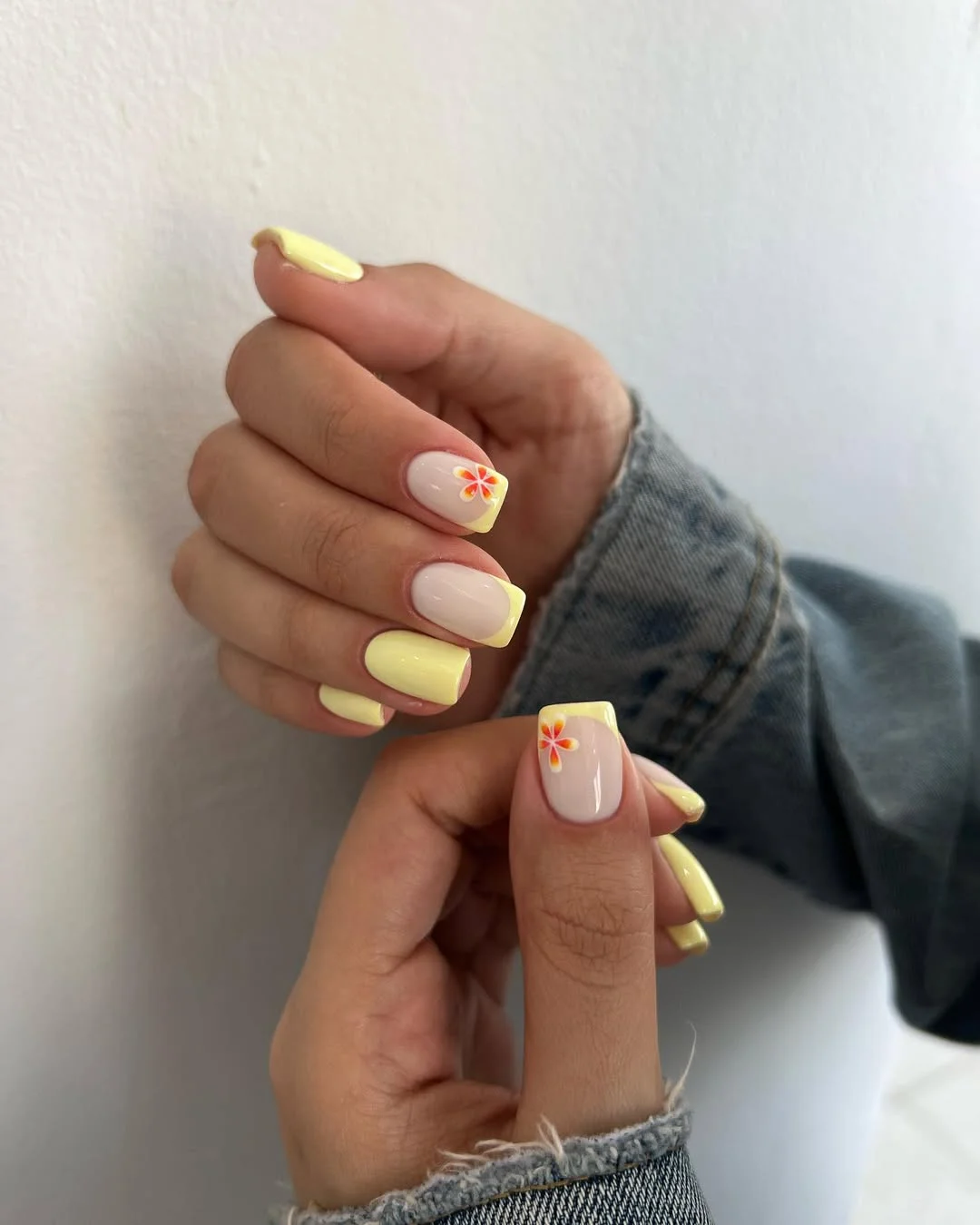 23 Summer yellow nails 2026 Pastel Lemon French Tips With Tiny Retro Flowers