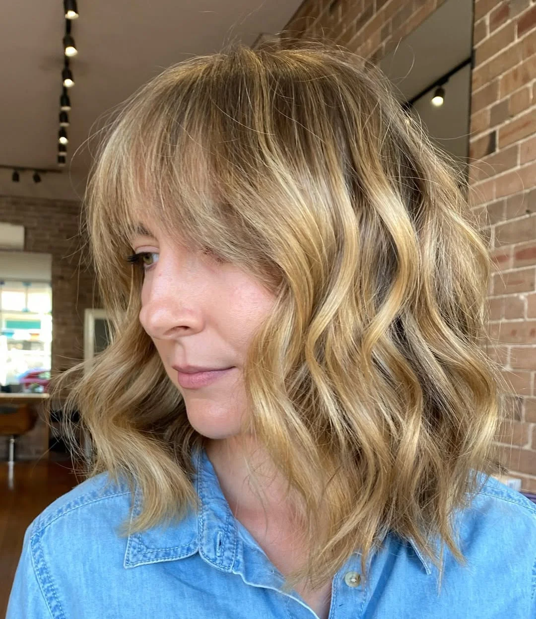 23 warm summer honey blonde hair color 2026 Soft Golden Honey Bob With Wispy Fringe