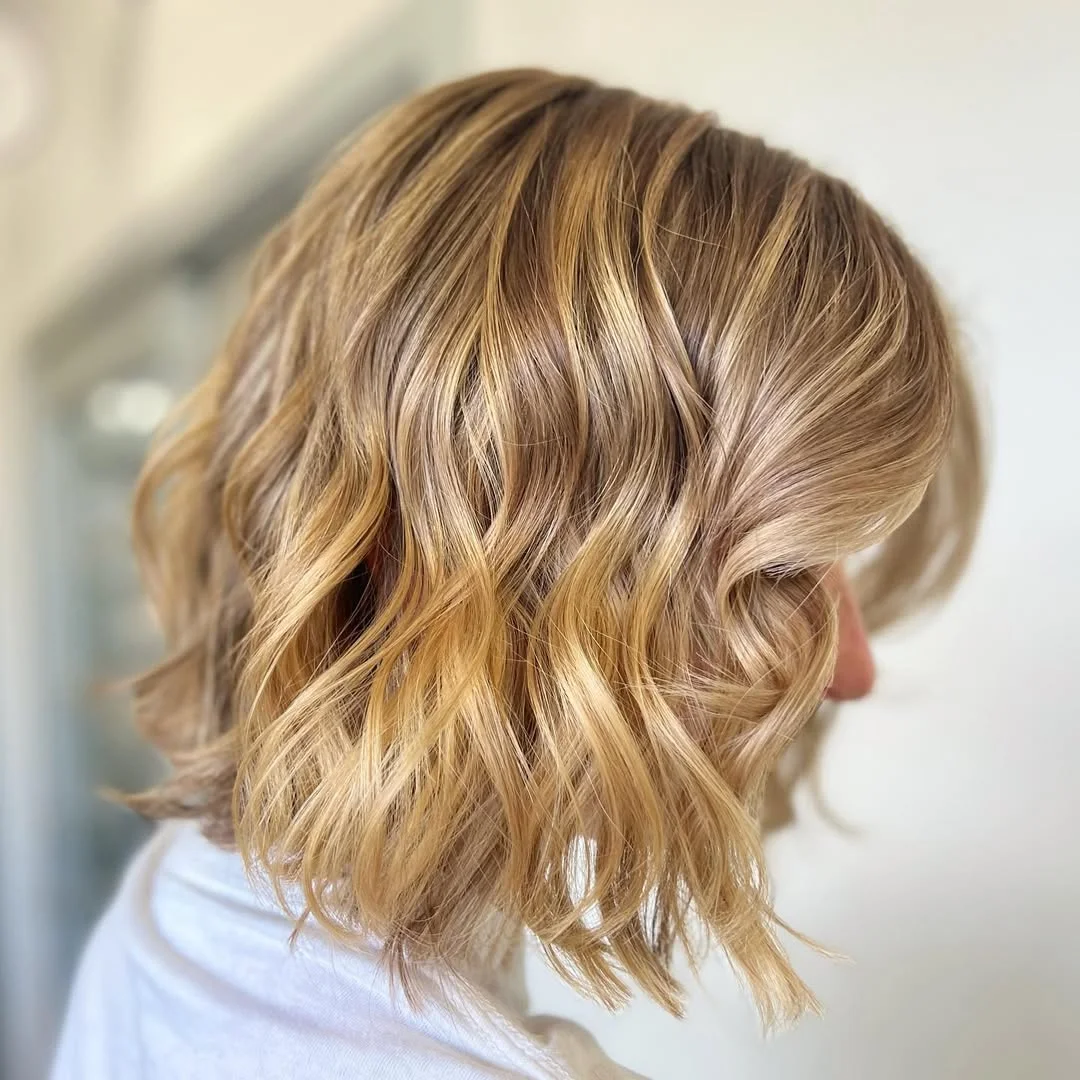 23 warm summer honey blonde hair color 2026 Honey Beige Textured Bob With Soft Golden Ribbons