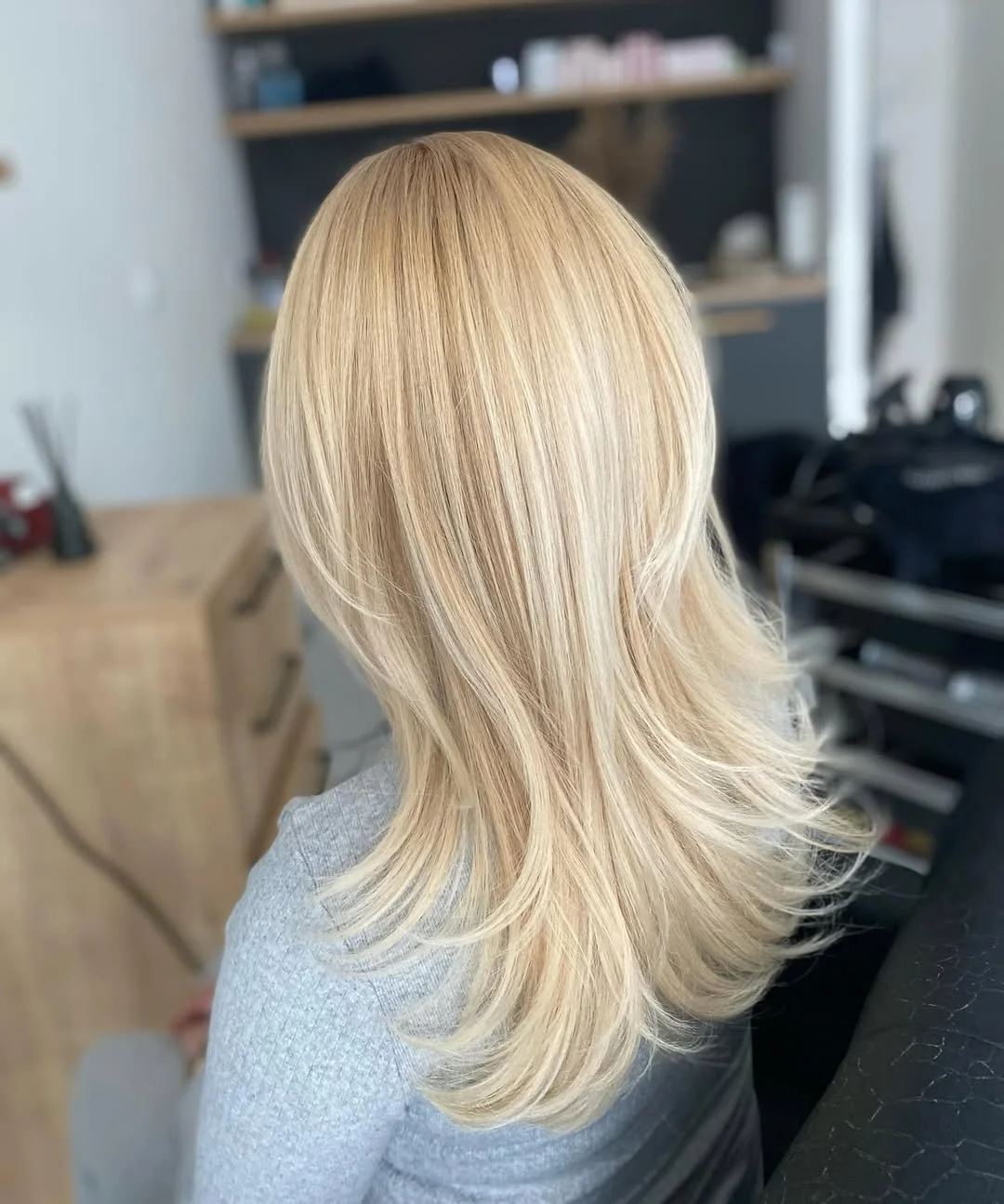23 warm summer honey blonde hair color 2026 Champagne Honey Layers With Feathered Movement