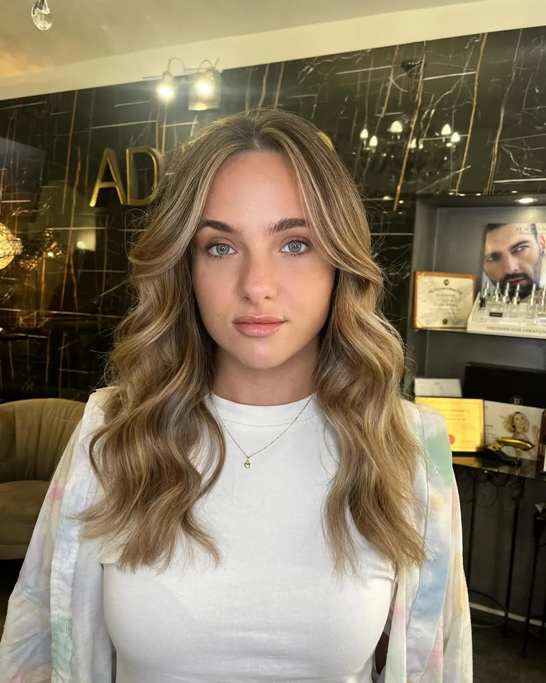 warm summer honey brown hair color 2026 Bright Honey Beige Waves With Dimensional Blonde Framing