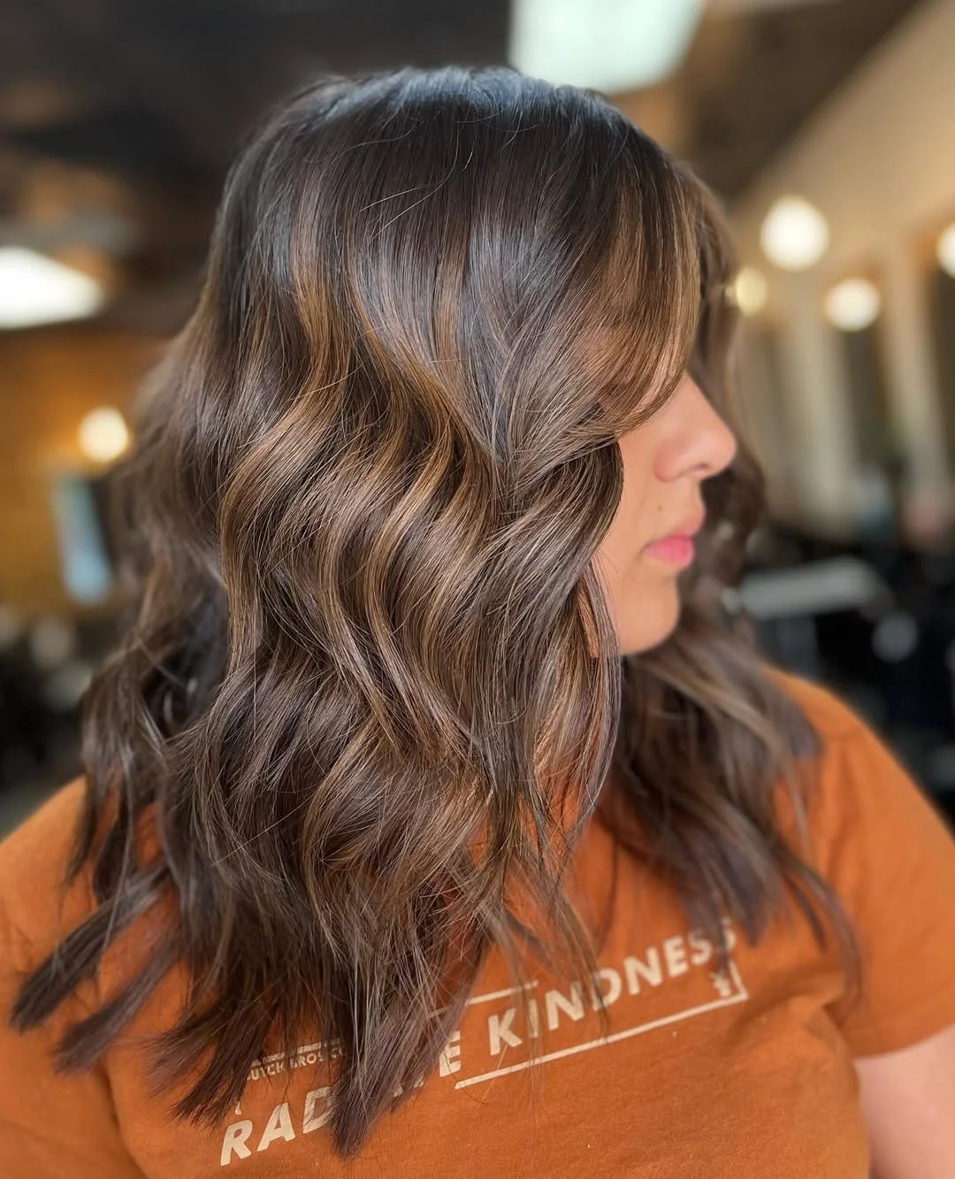 warm summer honey brown hair color 2026 Soft Espresso Waves With Subtle Honey Ribbons
