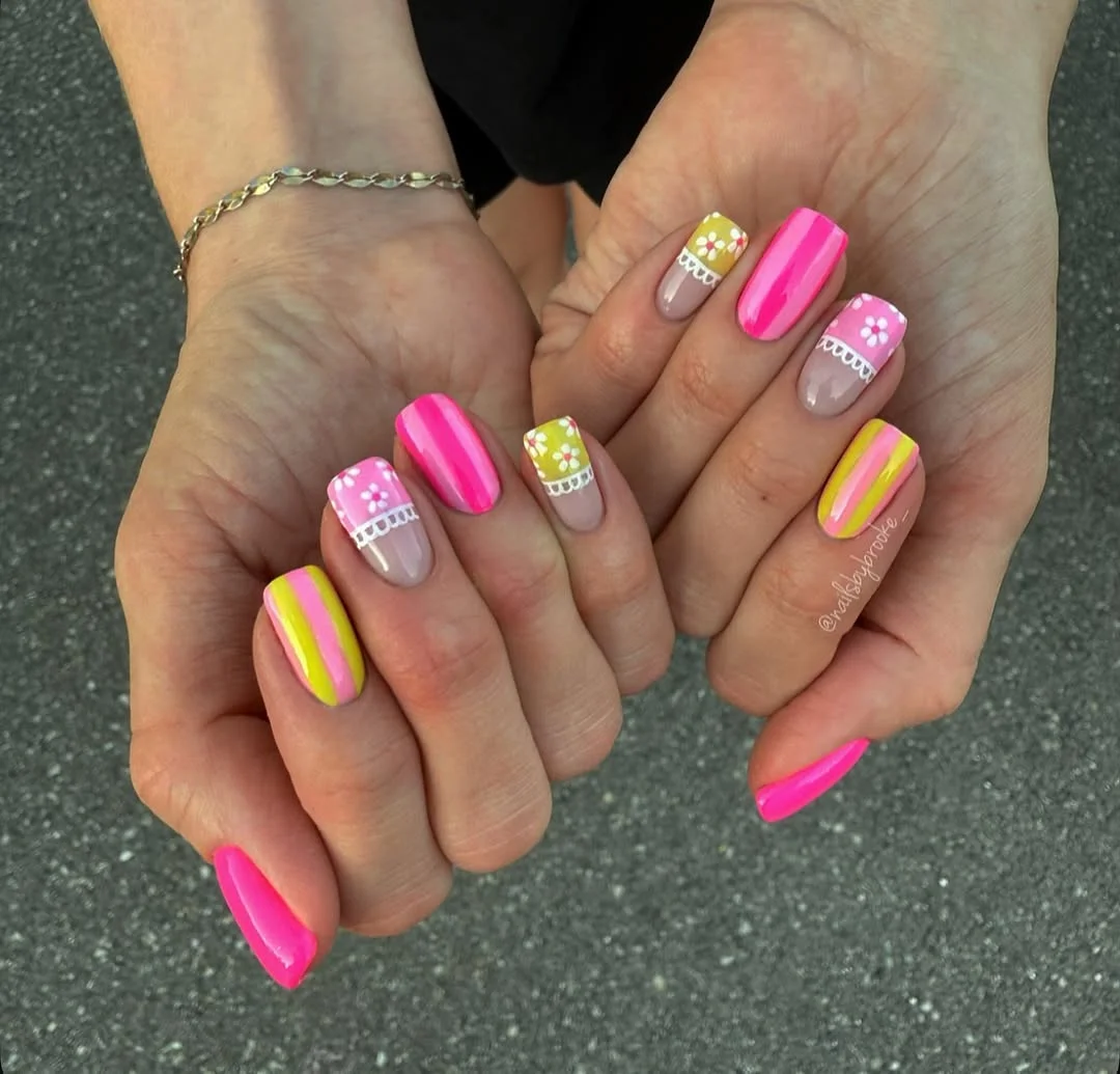 23 bright summer nails 2026 Retro Candy Stripes and Daisy Details