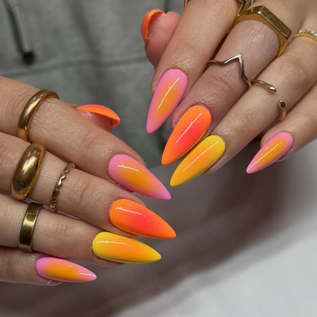 23 bright summer nails 2026 Sunrise Ombre Almond Nails That Glow Like Summer Evenings