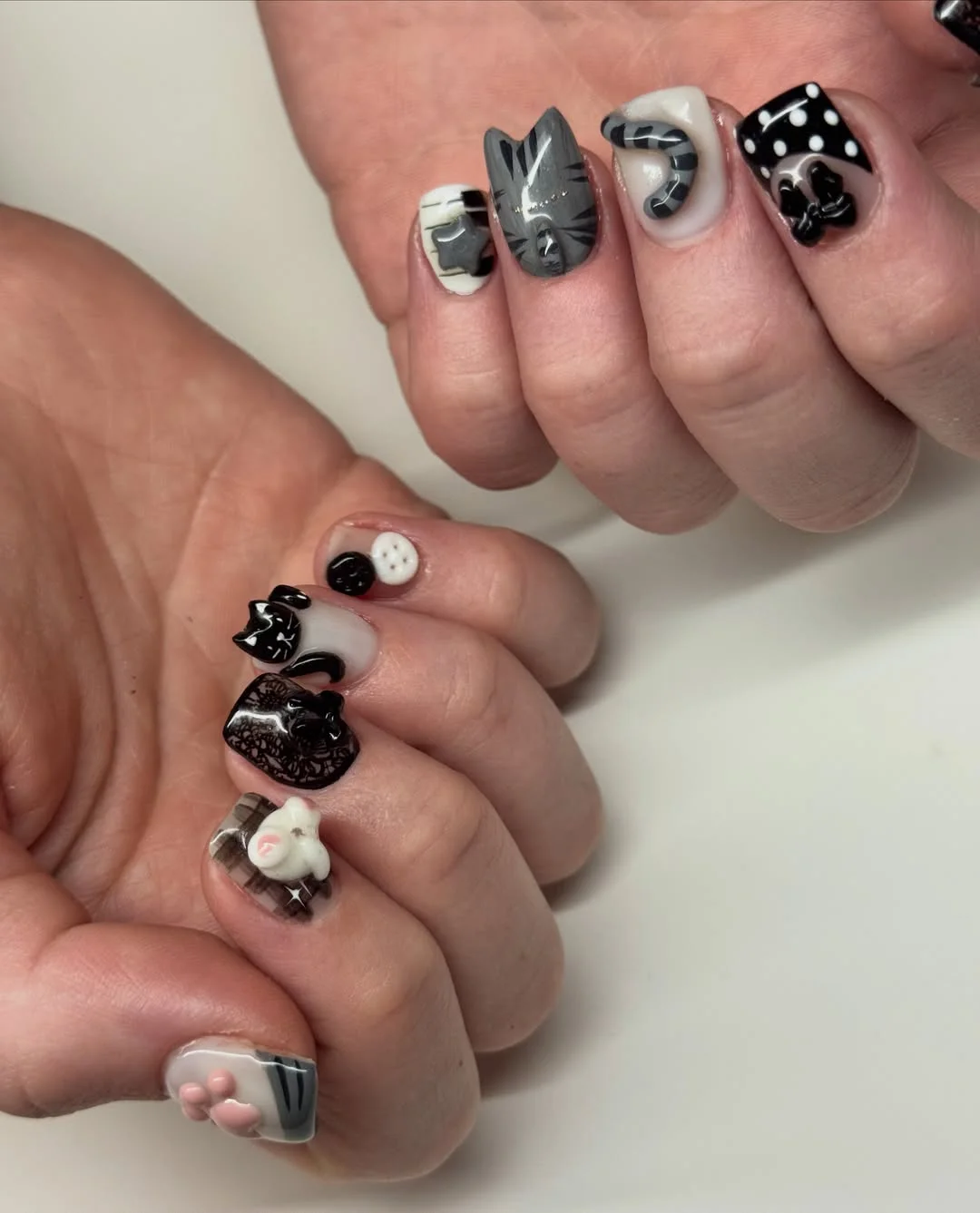 23 bright summer nails 2026 Playful Cat Inspired Nail Art With Dimensional Details