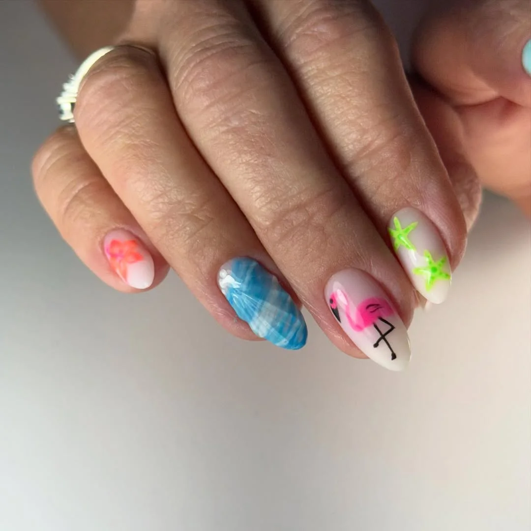23 bright summer nails 2026 Beach Day Nail Art Inspired by Ocean Treasures