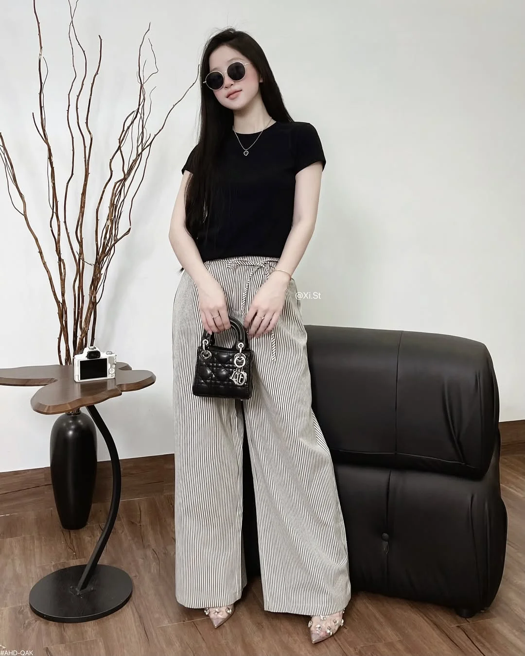 20 Early summer outfits 2026 Classic Black Tee and Striped Palazzo Trousers