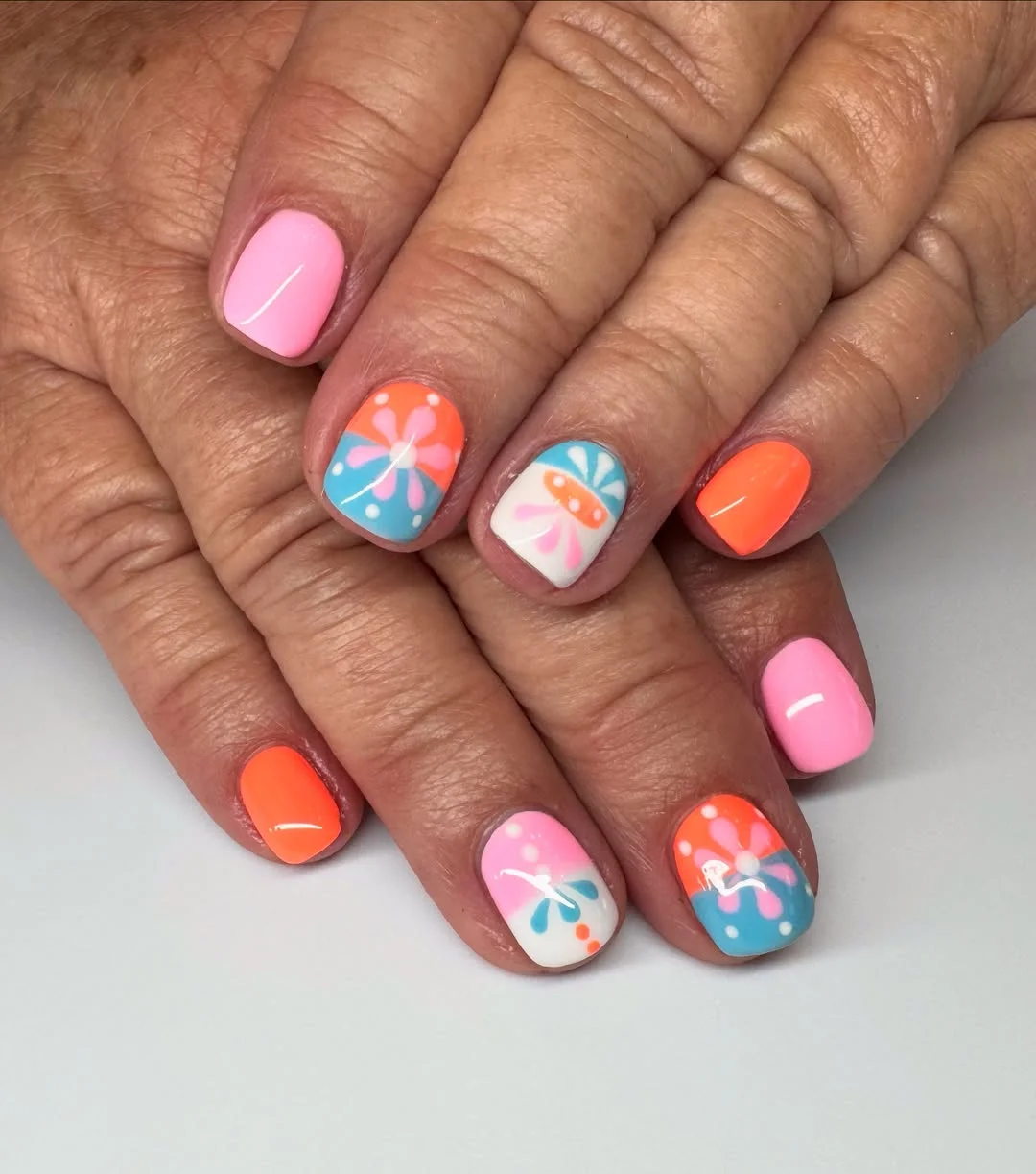 21 funky summer nails 2026 Retro Daisy Nails In Candy Colored Pastels