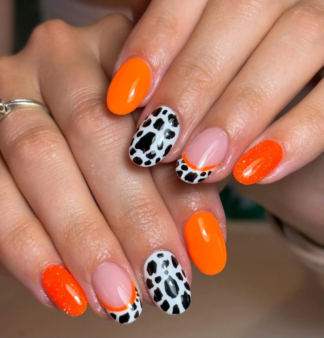 23 July nails design ideas 2026 Neon Orange And Animal Print Statement Nails