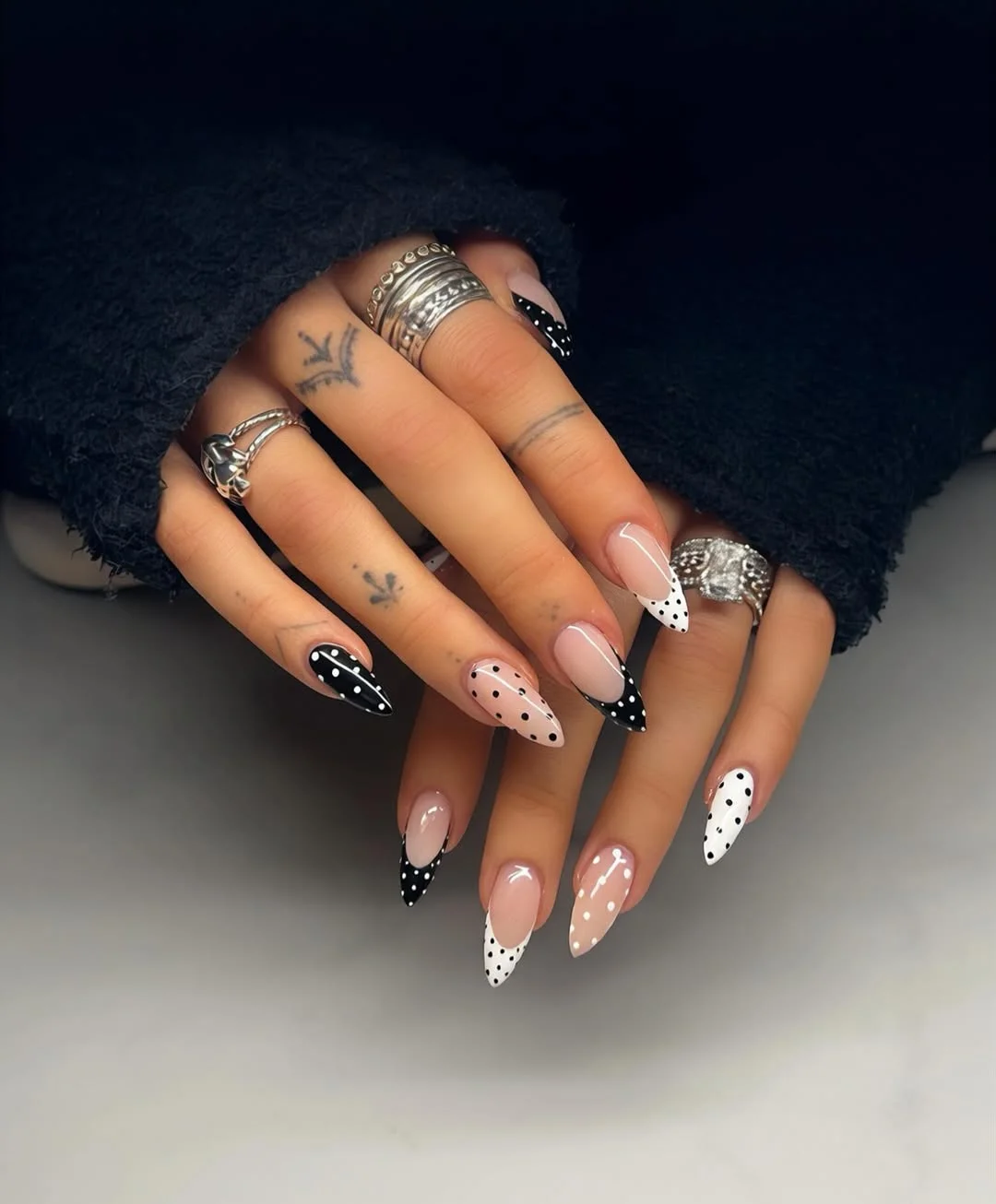 23 July nails design ideas 2026 Black And White Polka Dot Almond Nails