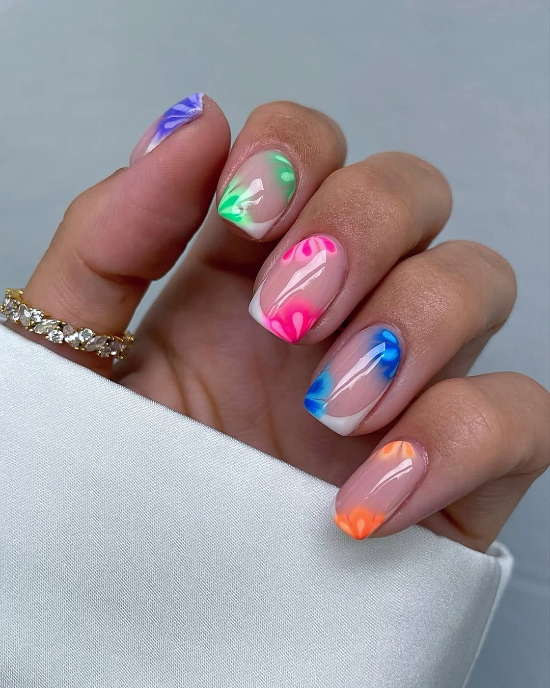 23 July nails design ideas 2026 Rainbow Aura French Tips With Neon Bloom Details