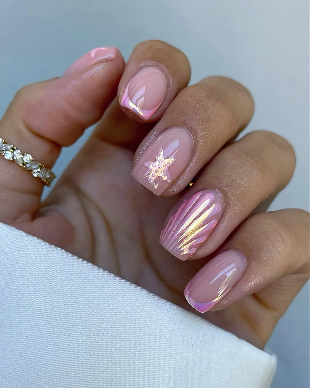 23 July nails design ideas 2026 Pink Pearl Seashell Nails With Iridescent Accents