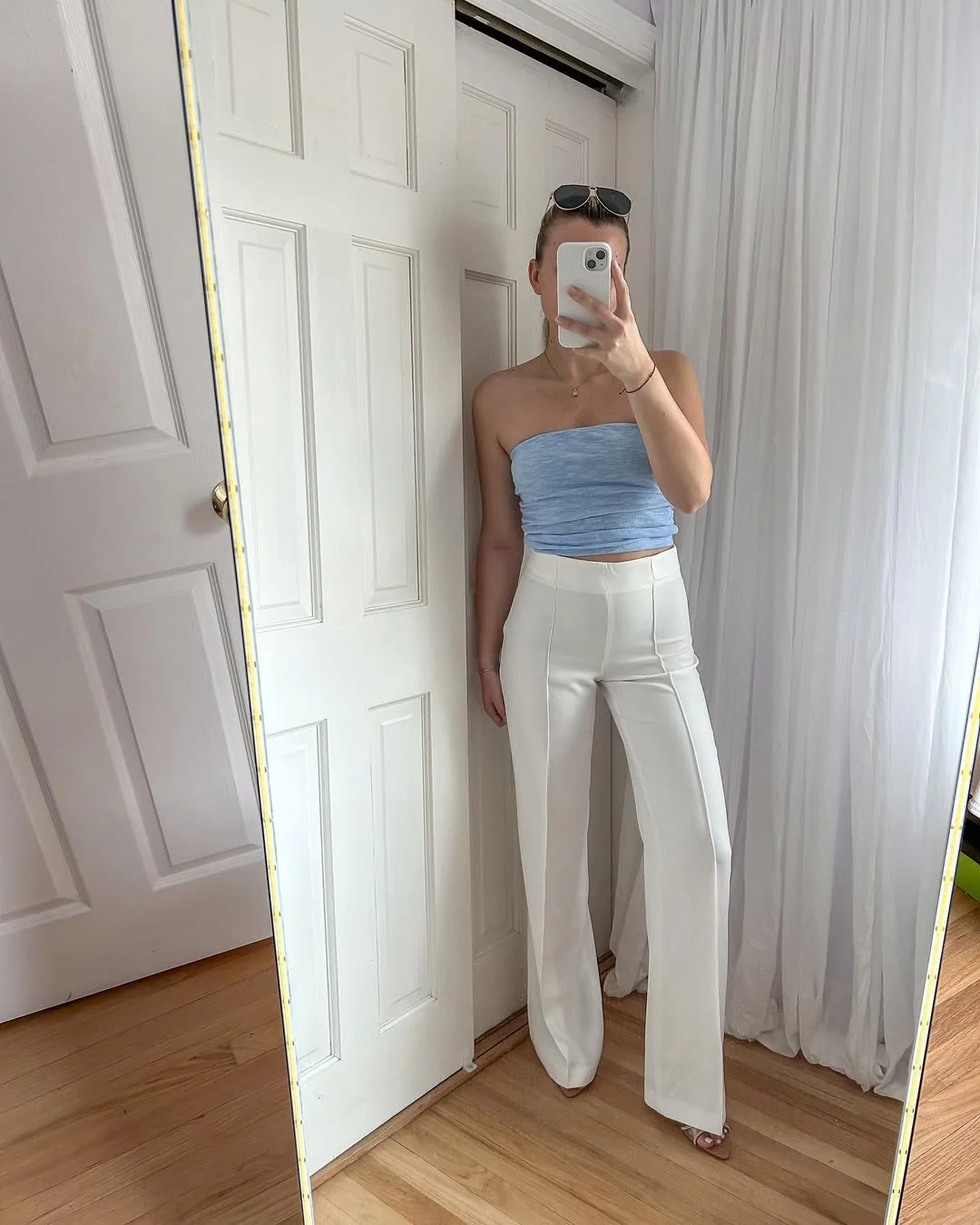 July Outfits Ideas 2026 Powder Blue Tube Top and White Trousers for a Chic Summer Evening