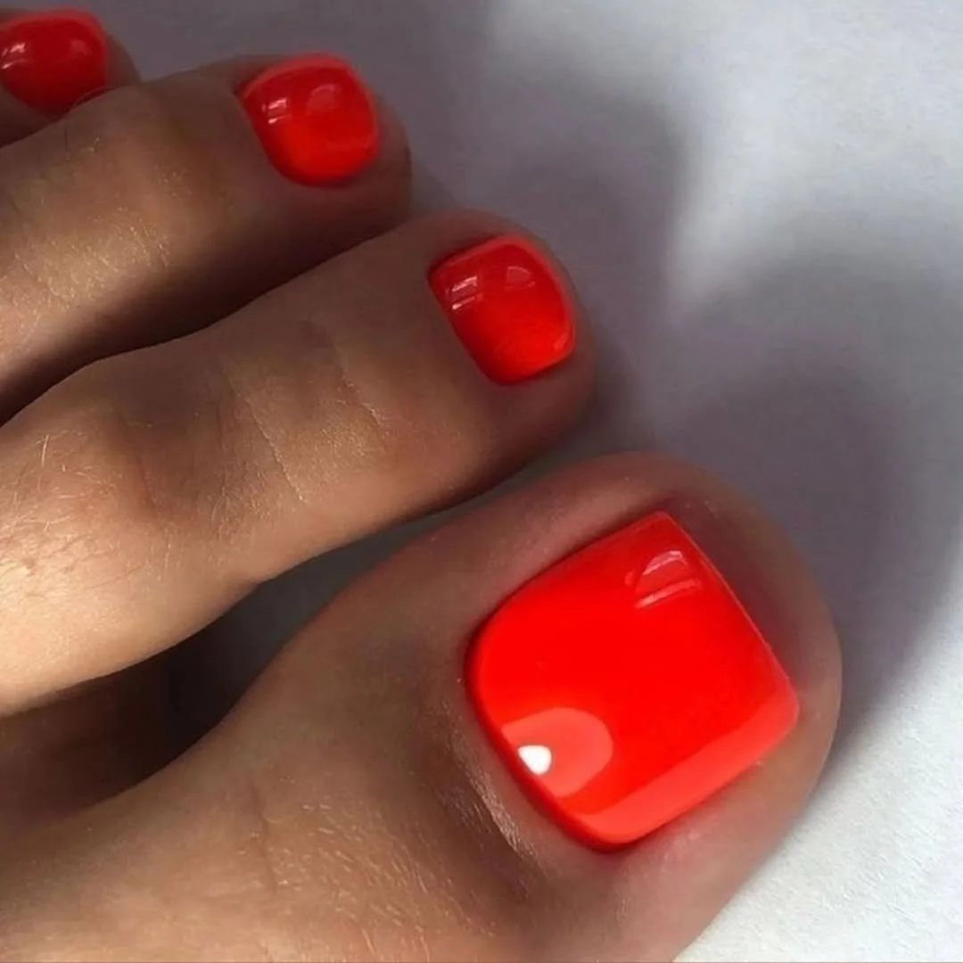 21 July toe nails design - summer ideas 2026 Electric Coral Pedicure That Glows In July Sunlight