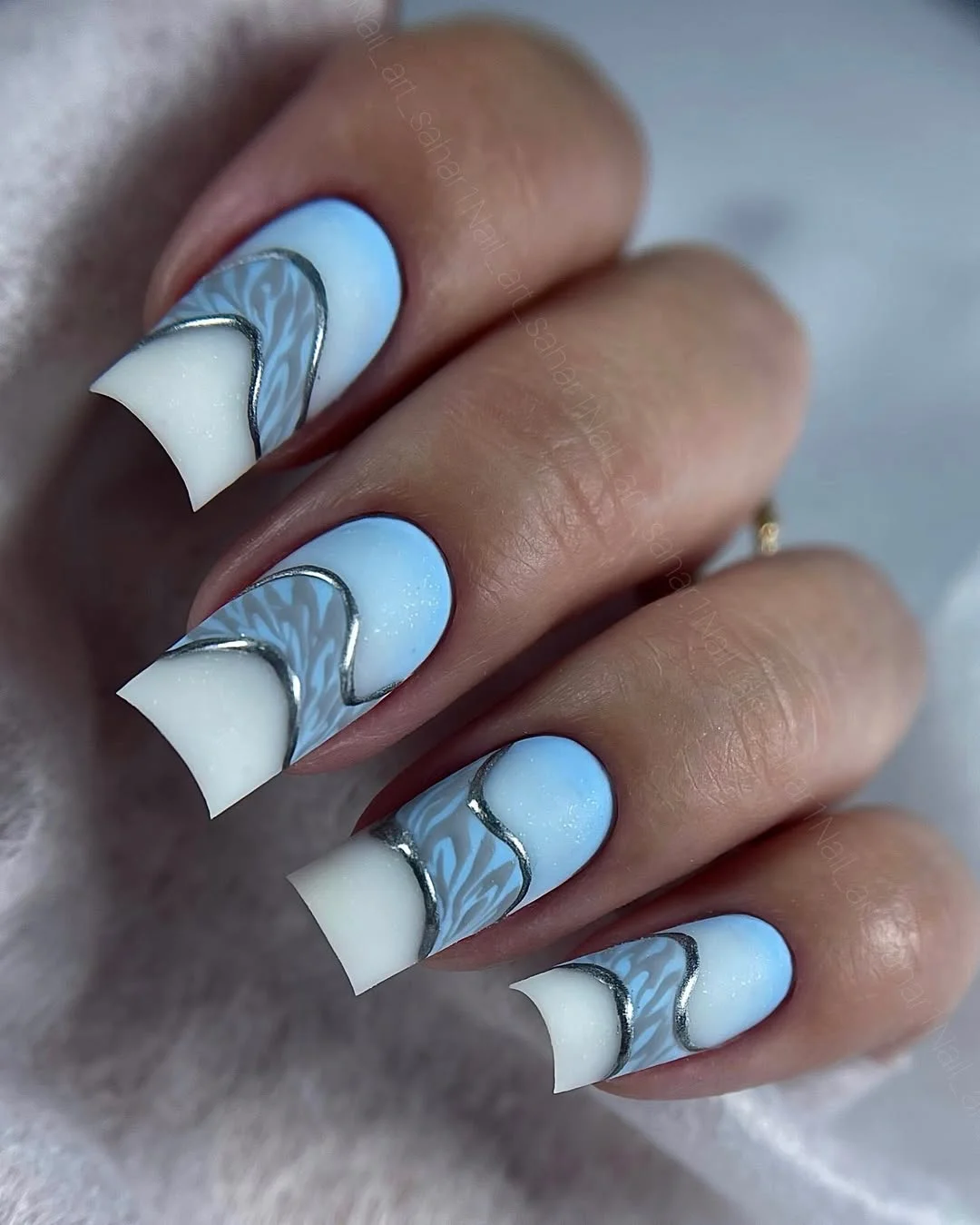 20 June manicure ideas 2026 Ice Blue Wave Nails with Modern French Influence