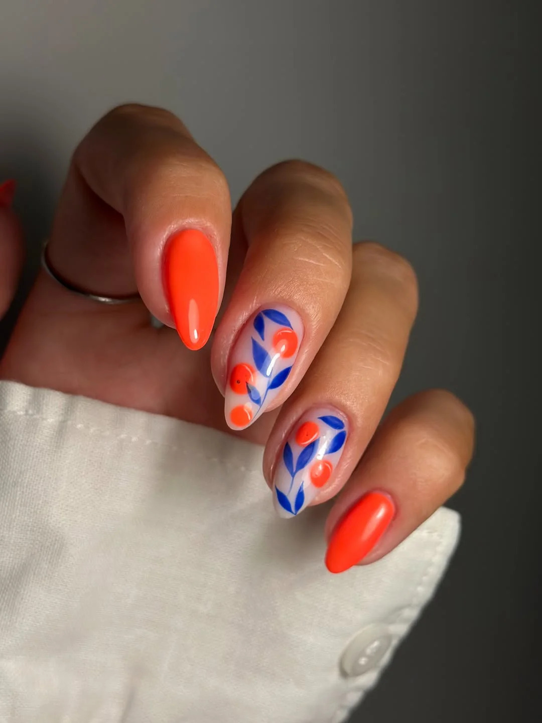 20 June manicure ideas 2026 Coral Cherry Nail Art with Mediterranean Charm