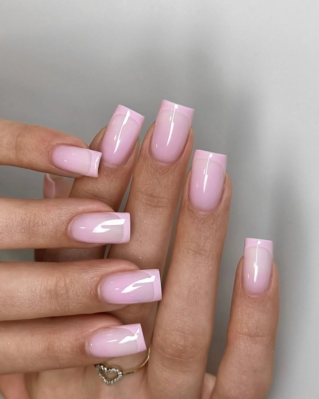 21 light summer nails 2026 Glossy Baby Pink Nails With Barely-There French Edges