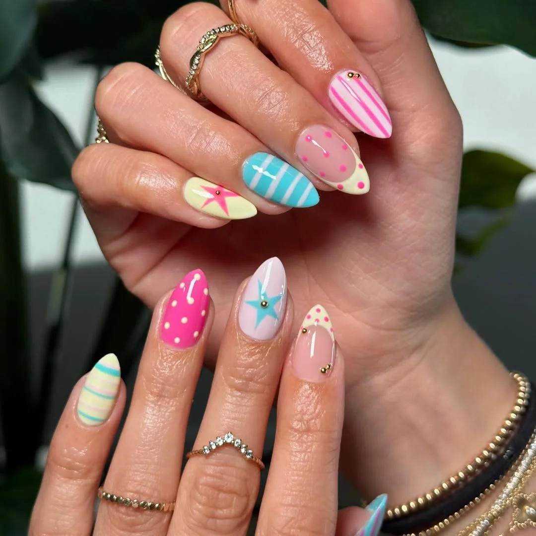 21 light summer nails 2026 Retro Candy Stripe Nails With Playful Pastel Motifs