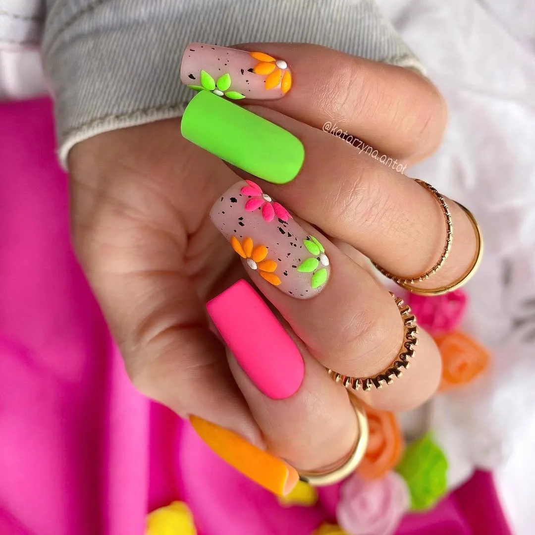 21 light summer nails 2026 Neon Garden Party Nails With Playful Floral Details