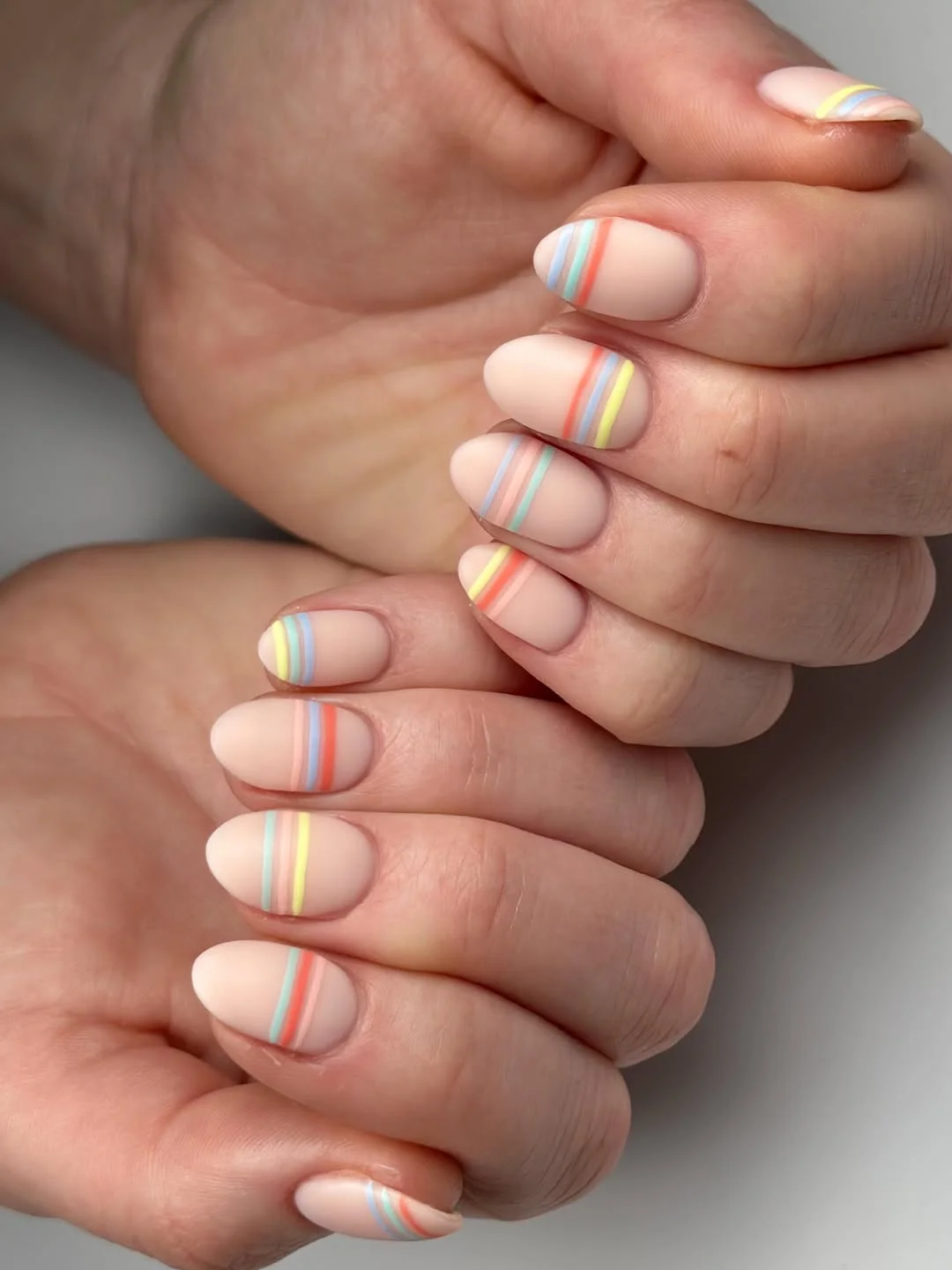 21 light summer nails 2026 Minimalist Rainbow Stripe Nails In Soft Sorbet Tones