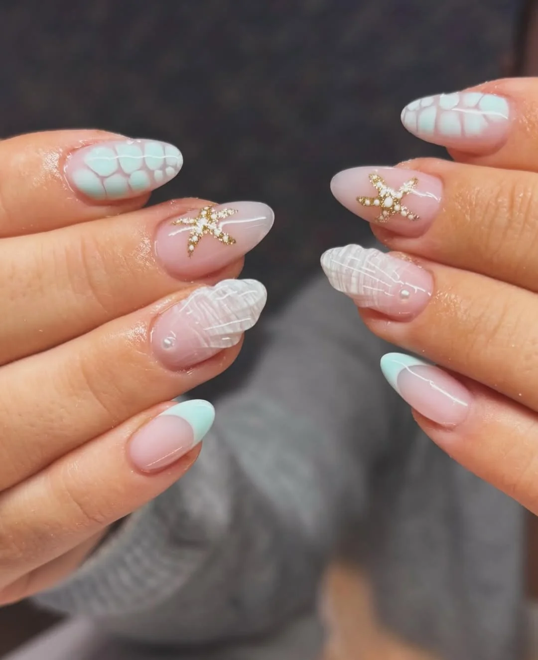 24 starfish summer nails 2026 Teal French Tips With Delicate Starfish Elegance