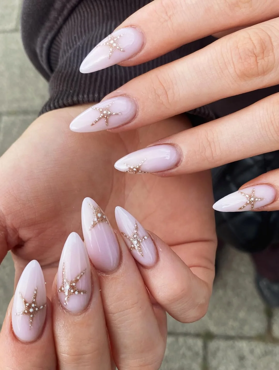 24 starfish summer nails 2026 Soft White Almond Nails With Delicate Gold Starfish Art