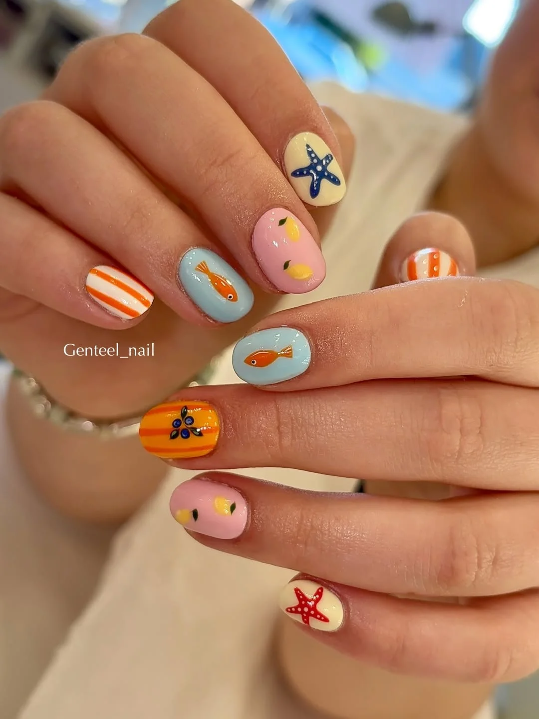 24 starfish summer nails 2026 Bright Coastal Charm With Starfish Fish and Citrus Details