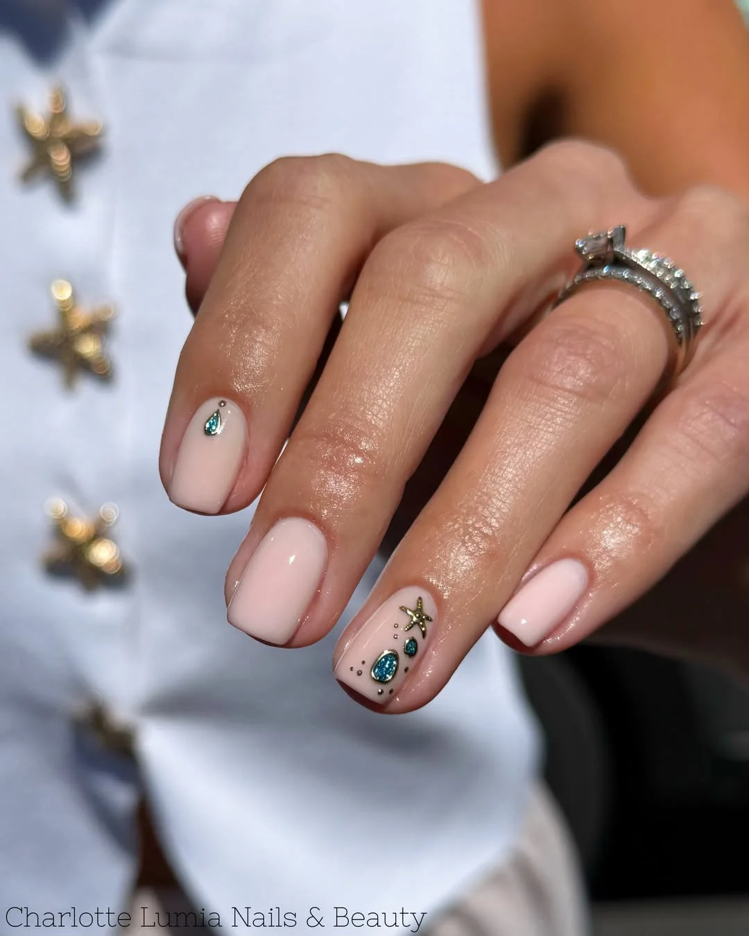 24 starfish summer nails 2026 Simple Nude Nails With Gold Starfish Accents