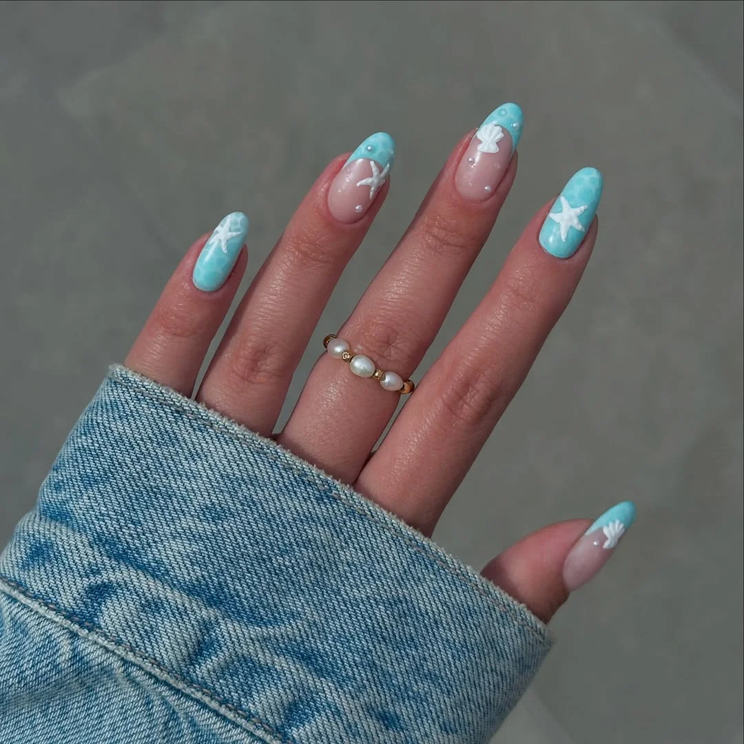 21 summer oval nails 2026 Ocean Water Nails With Delicate Seashell Accents
