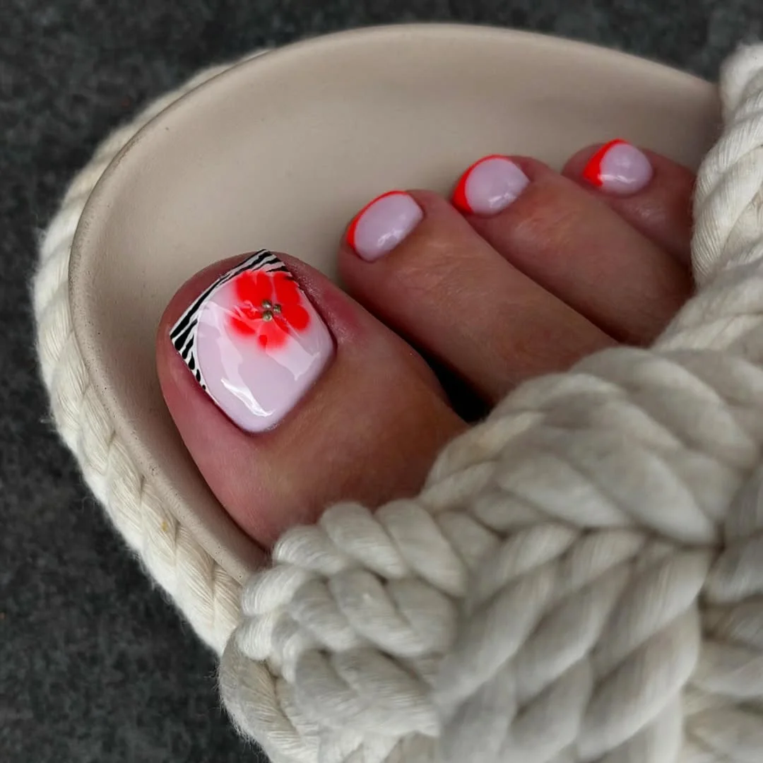 summer pedicure nail art 2026 Neon Floral Accent Pedicure With Graphic Summer Contrast