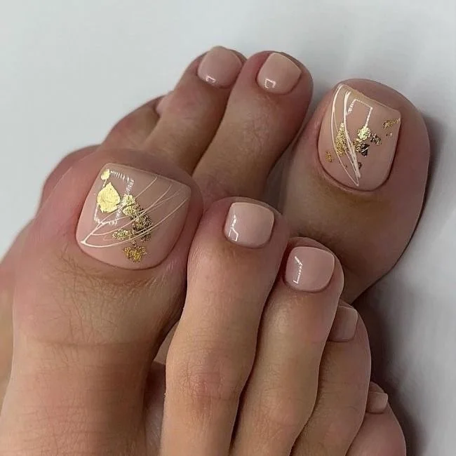 summer pedicure nail art 2026 Minimalist Nude Pedicure With Gold Botanical Details