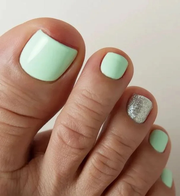 21 summer toe nails design ideas 2026 Mint Green Pedicure With Silver Sparkle Accent