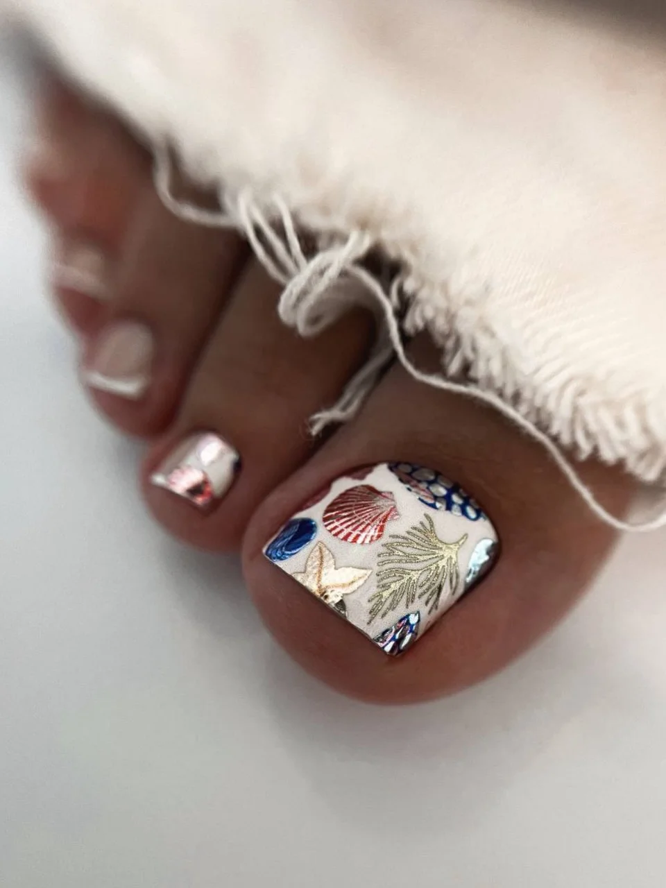 21 summer toe nails design ideas 2026 Seaside Shell Art for a Tropical Summer Escape