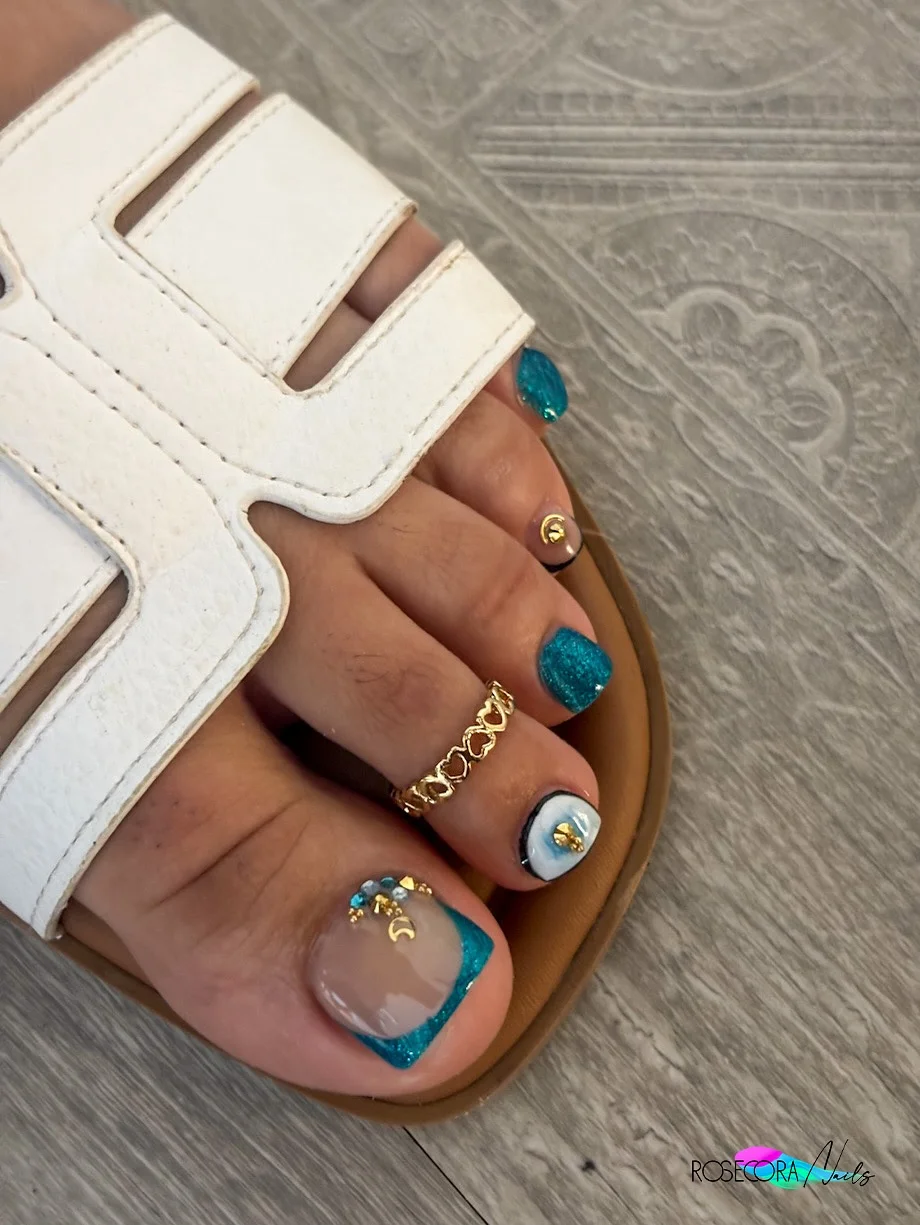 21 summer toe nails design ideas 2026 Teal Glitter French Tips With Coastal Glamour